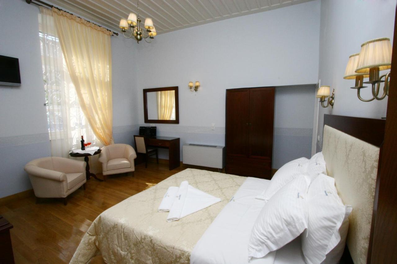 Apollonion Palace Ермополи Стая снимка